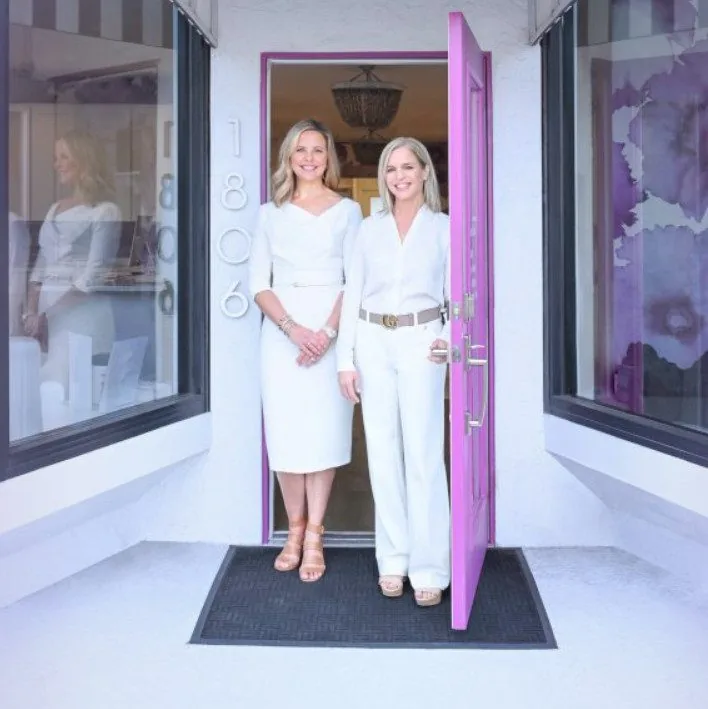 Founders Beth Bobb and Susan McCann at the front door of Sarasota Facial Aesthetics on South Osprey Avenue